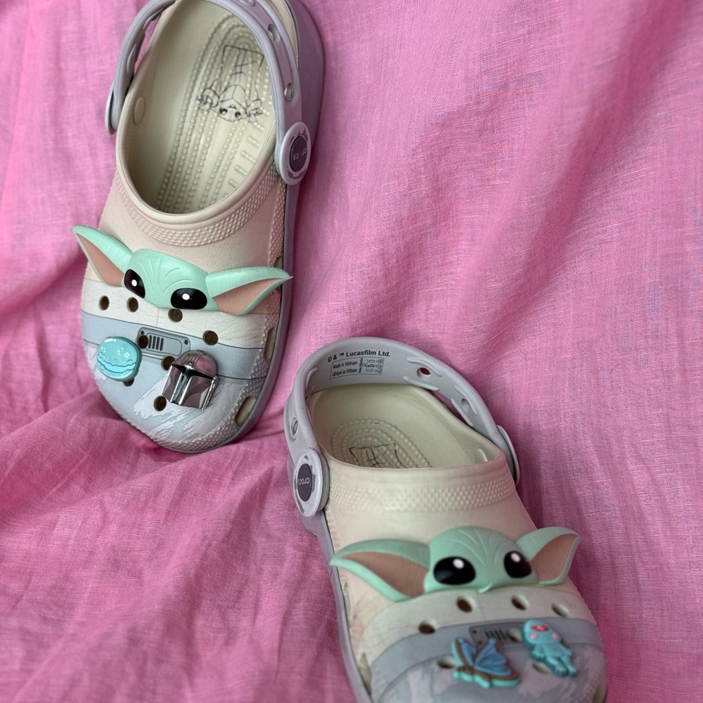 CROCS Cream and Green Sandals with Playful Cartoon Design